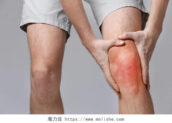 年轻人患有膝关节疼痛摄影图